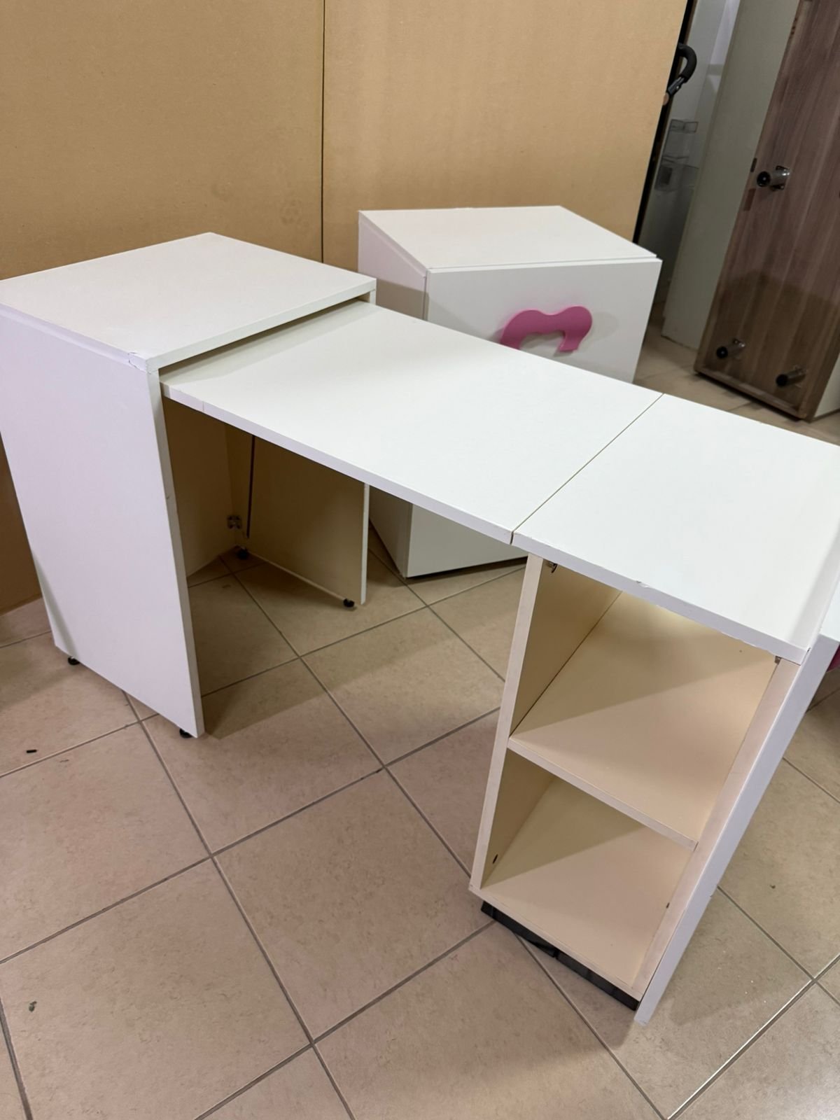 A white children's study desk with pink handles, featuring a foldable - Image 2