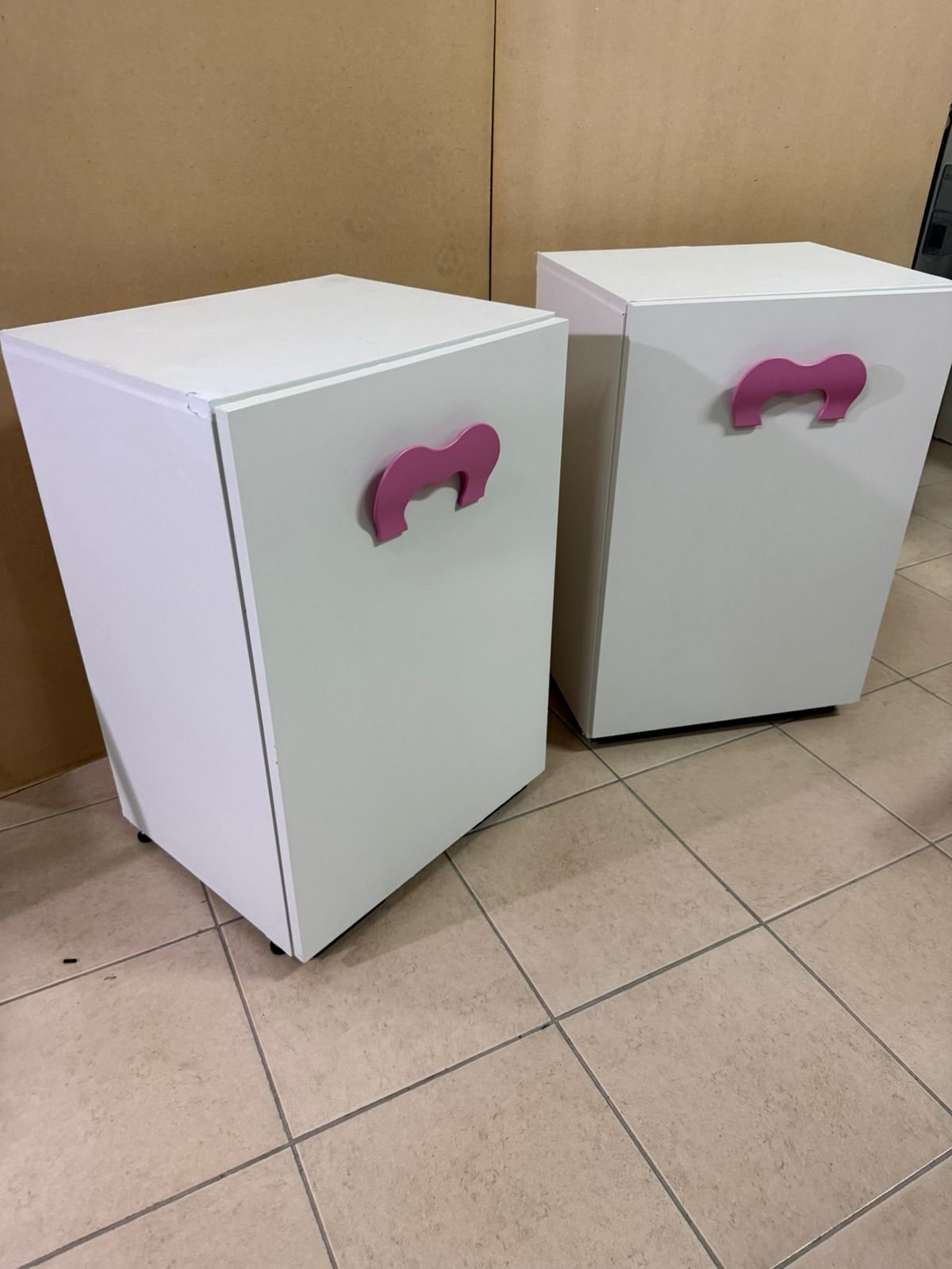 A white children's study desk with pink handles, featuring a foldable - Image 10