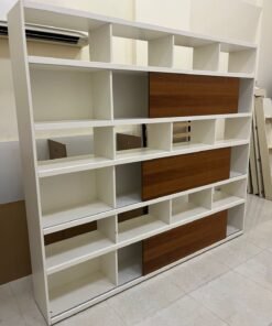 White shelving unit with sliding doors