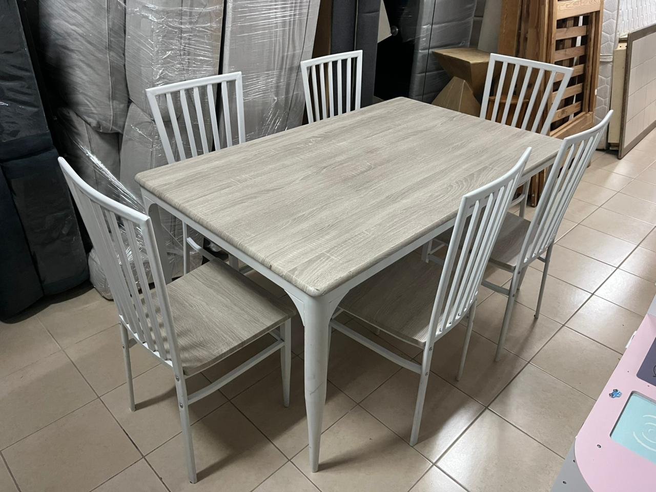 Dining table with six chairs, beige and white color, from Home Box