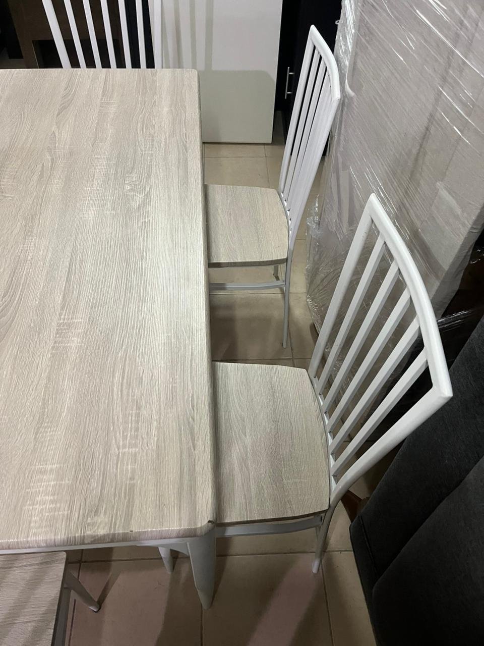 Dining table with six chairs, beige and white color, from Home Box - Image 8