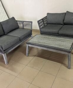 Outdoor seating set consisting of two sofas and a coffee table