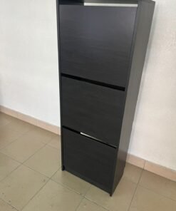 IKEA BISSA shoe cabinet with 3 compartments in black and brown.