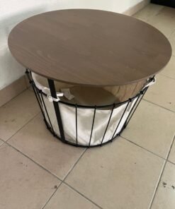 IKEA storage table with a wooden top and metal base, plus a fabric storage basket.