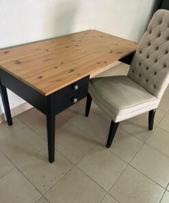 IKEA desk in black, made of solid pine wood.