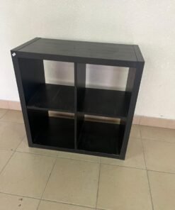 KALLAX shelving unit from IKEA in black and brown.