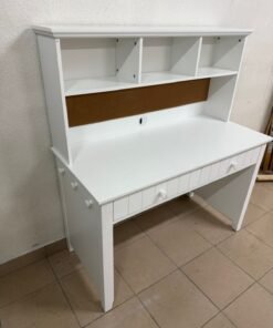 White desk and storage cabinet from Pottery Barn Kids.