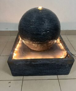 Outdoor ball-shaped water fountain with lighting