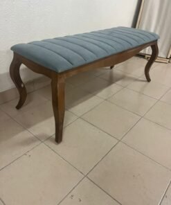 upholstered bench with a wooden frame