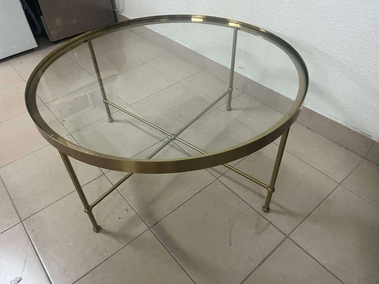 TORSJÖ coffee table in gold and glass from IKEA.