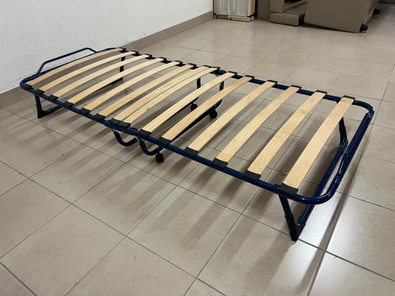 A foldable bed suitable for guests and camping