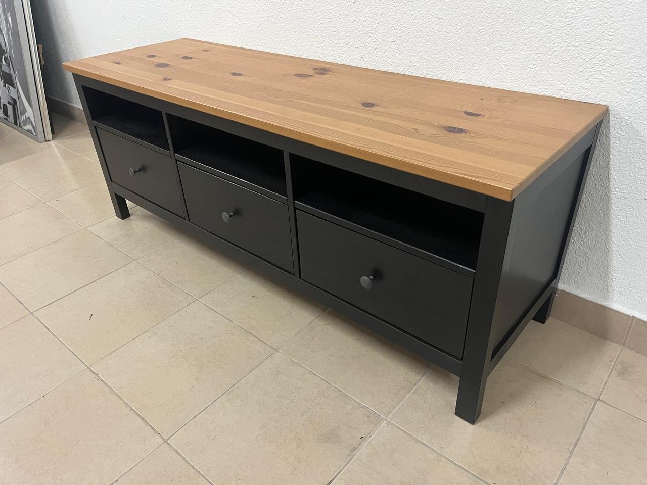 IKEA HEMNES TV stand in black and brown.