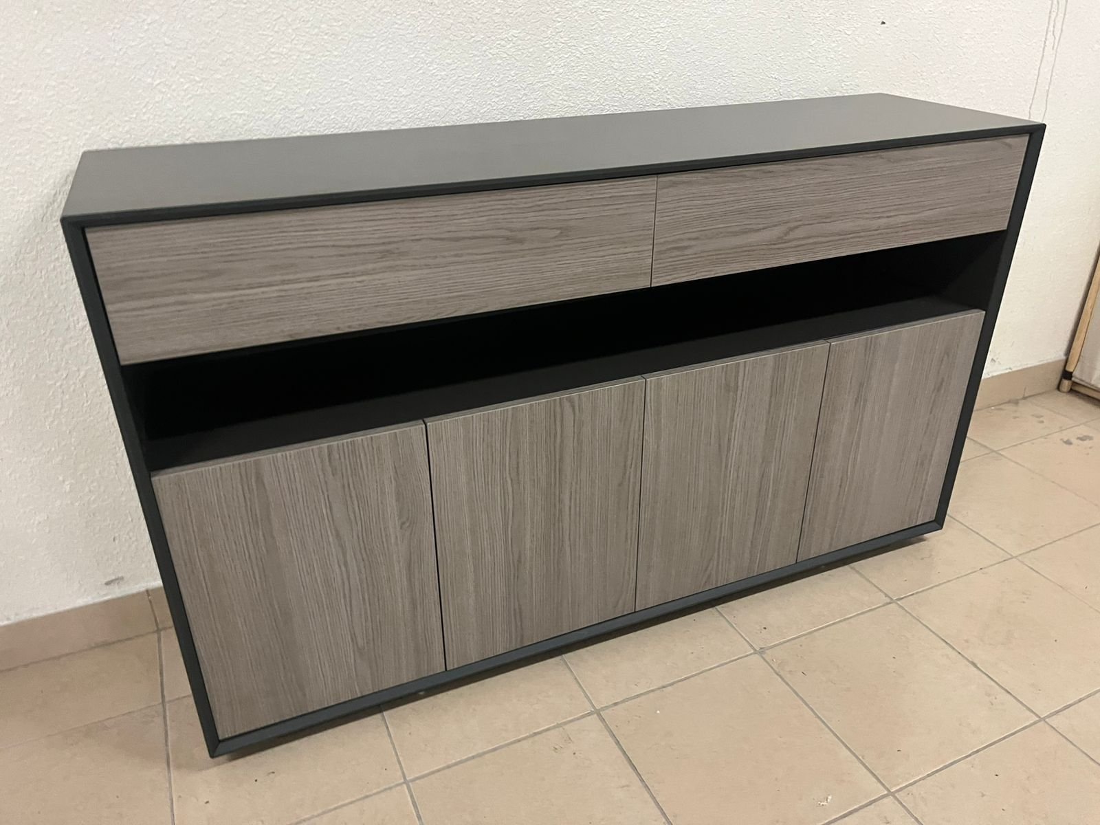Modern buffet with a low-profile design and gray wood finish