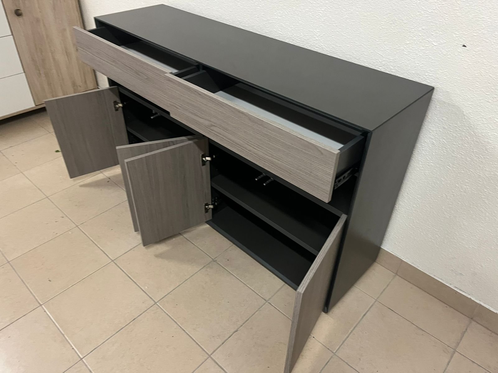 Modern buffet with a low-profile design and gray wood finish - Image 12
