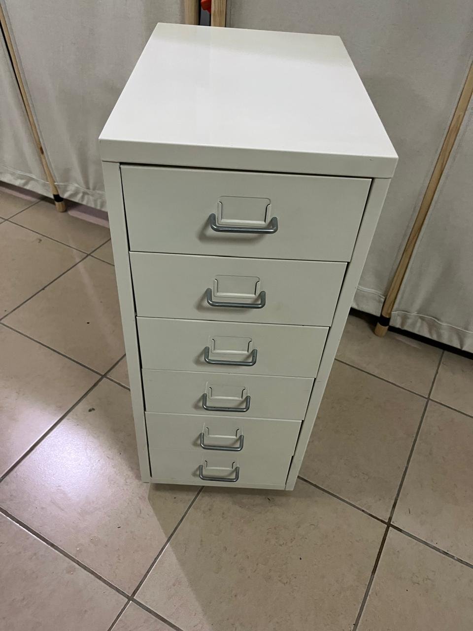 The "Helmer" drawer unit from IKEA is white and equipped with wheels. - Image 2
