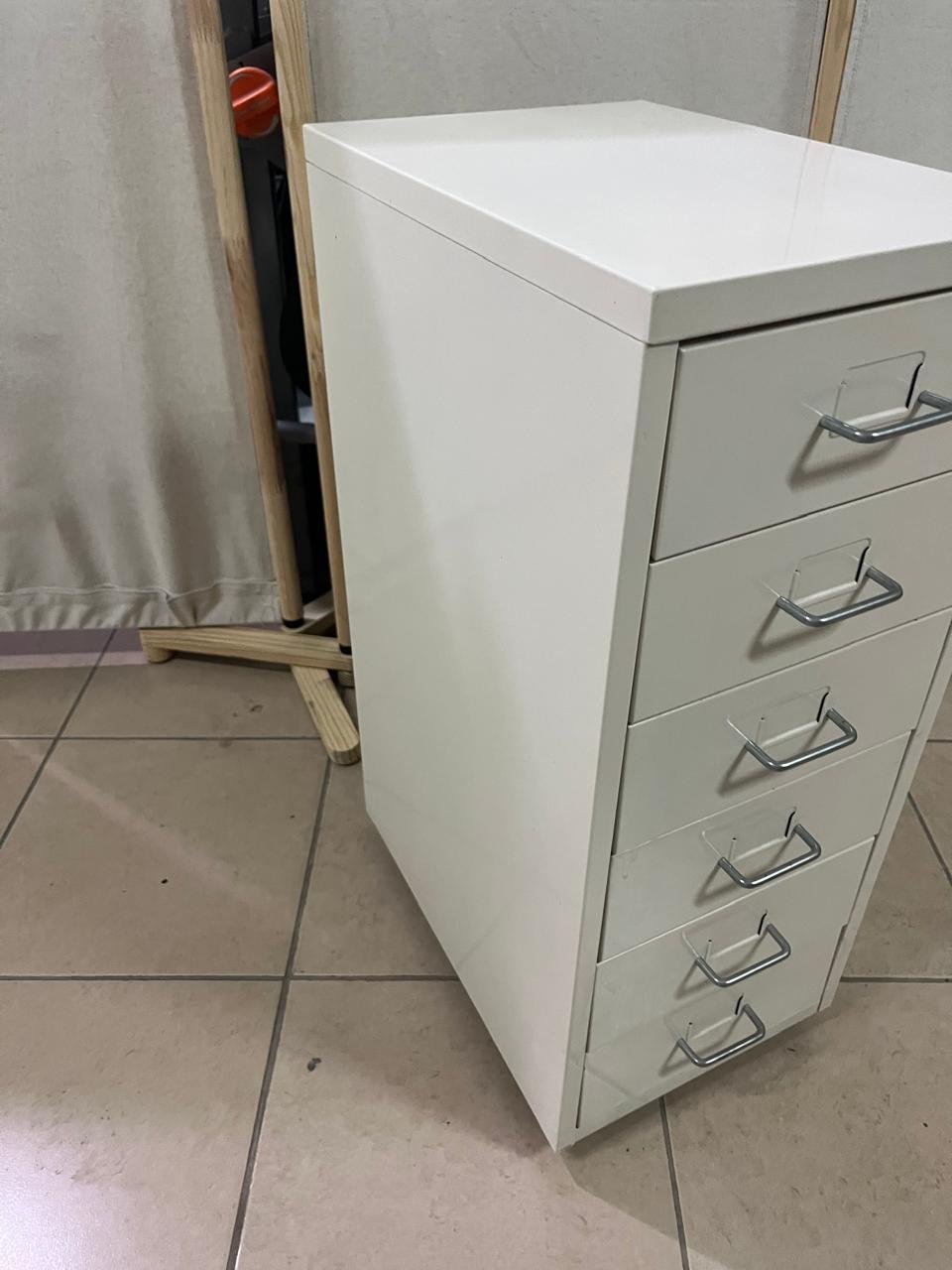 The "Helmer" drawer unit from IKEA is white and equipped with wheels. - Image 3