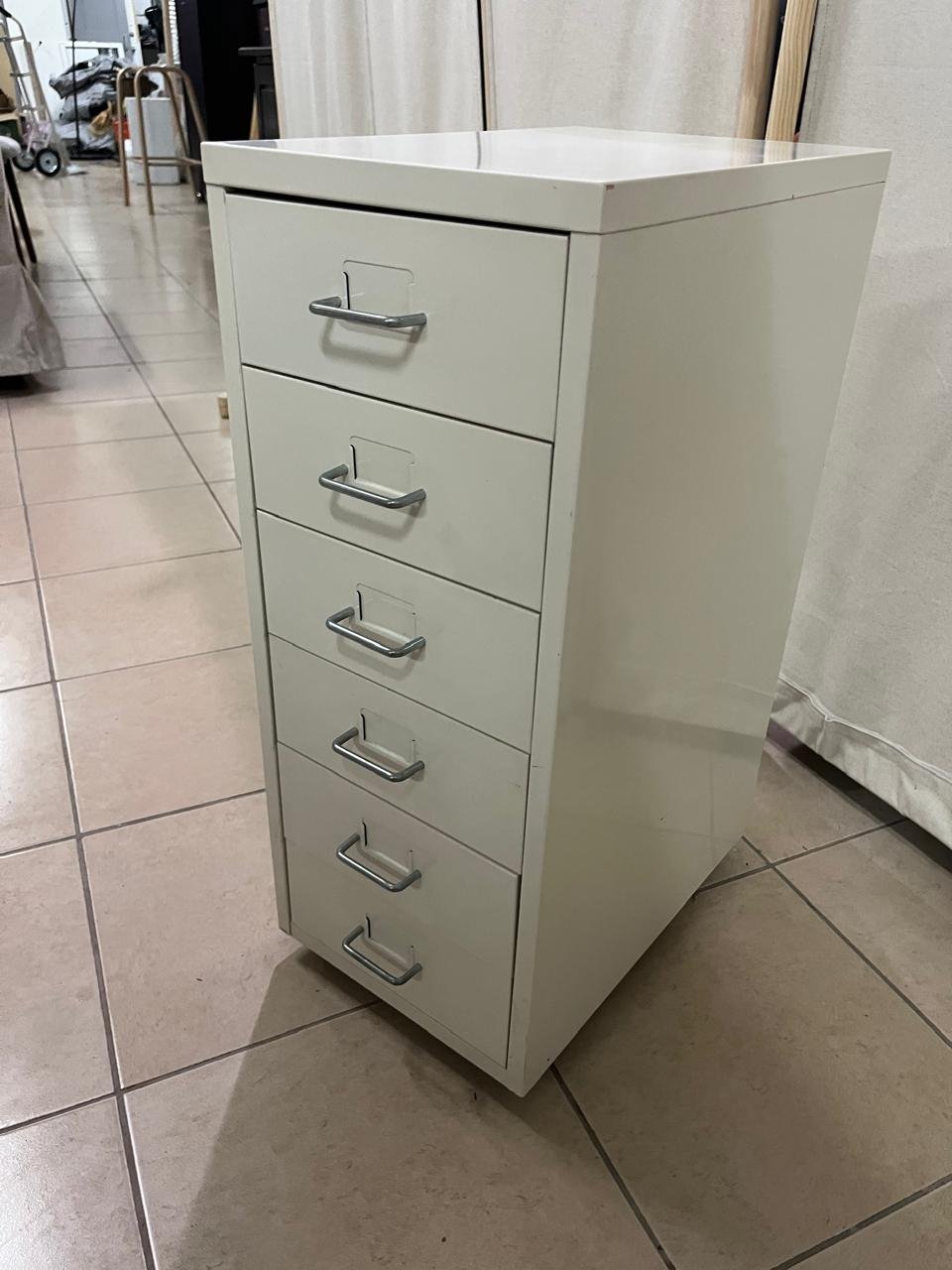 The "Helmer" drawer unit from IKEA is white and equipped with wheels. - Image 4