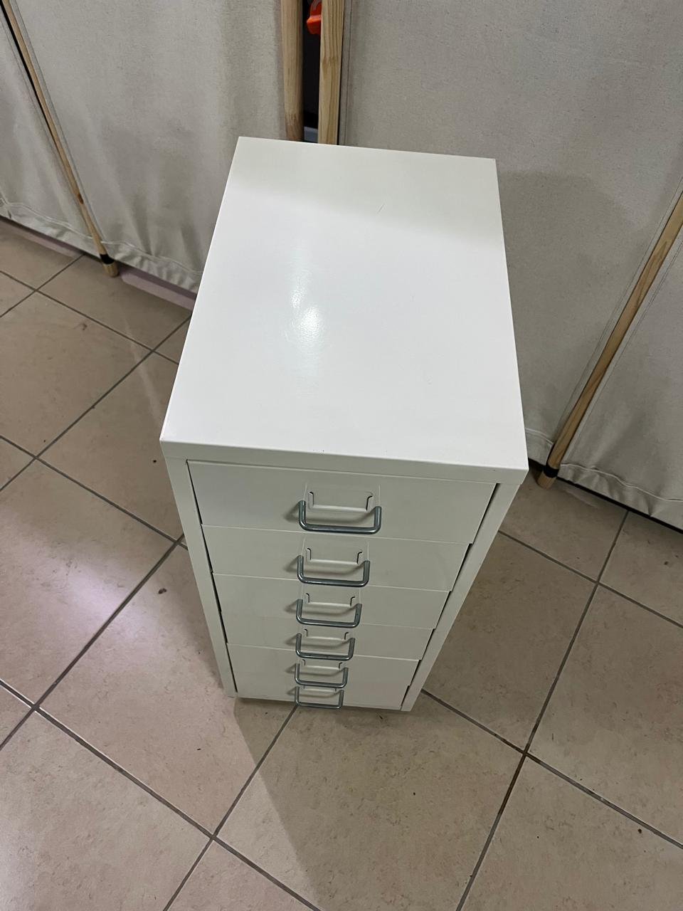 The "Helmer" drawer unit from IKEA is white and equipped with wheels. - Image 5
