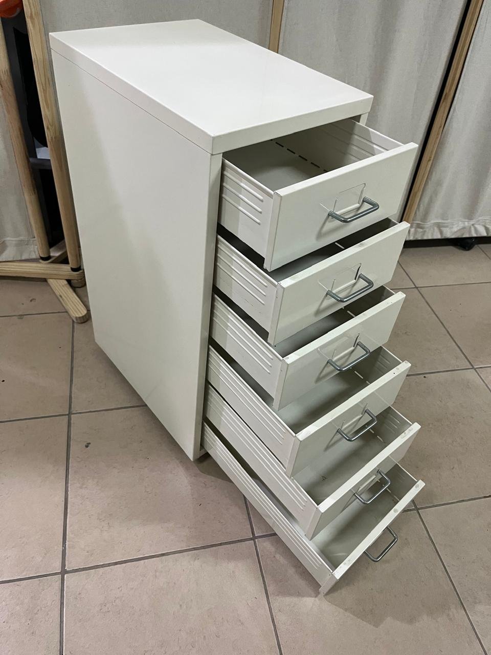 The "Helmer" drawer unit from IKEA is white and equipped with wheels. - Image 8