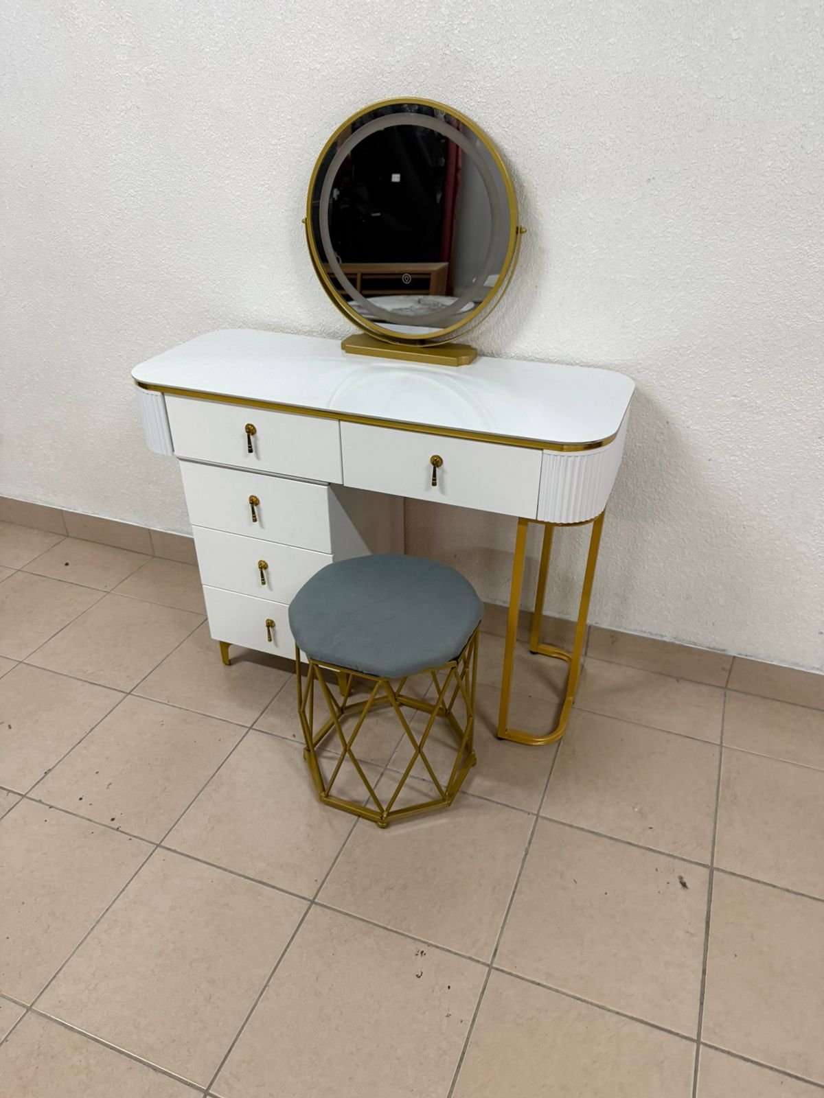 Modern white and gold makeup table with an elegant design - Image 7