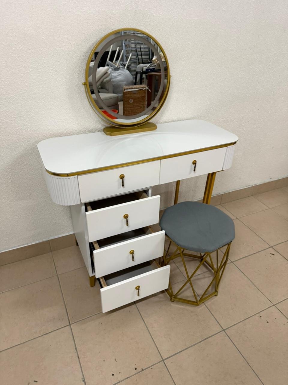 Modern white and gold makeup table with an elegant design - Image 9
