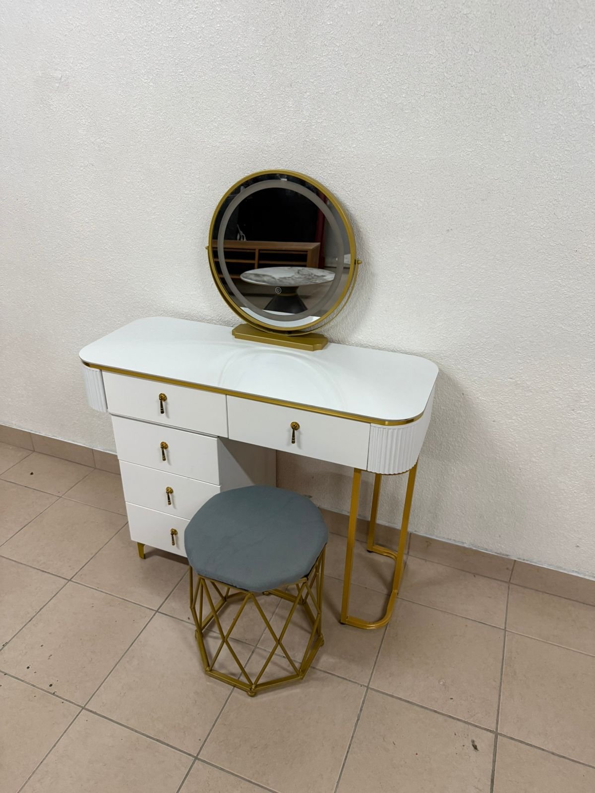 Modern white and gold makeup table with an elegant design - Image 11