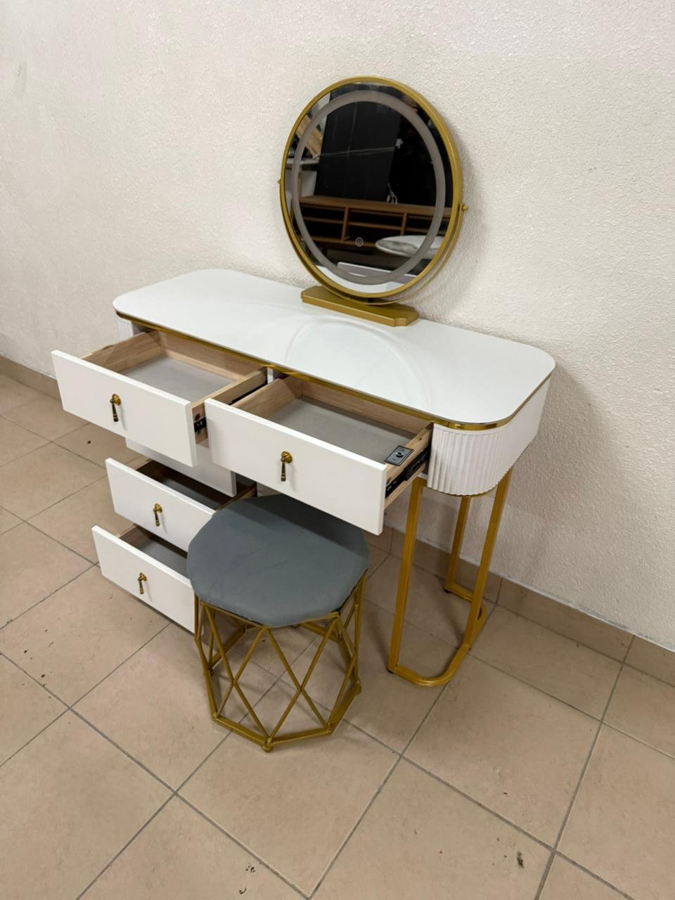 Modern white and gold makeup table with an elegant design - Image 15