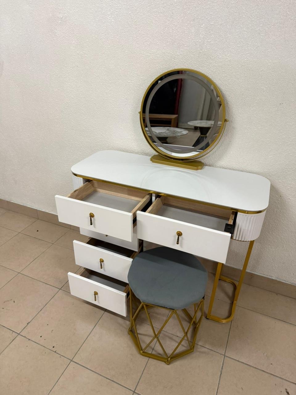 Modern white and gold makeup table with an elegant design - Image 16