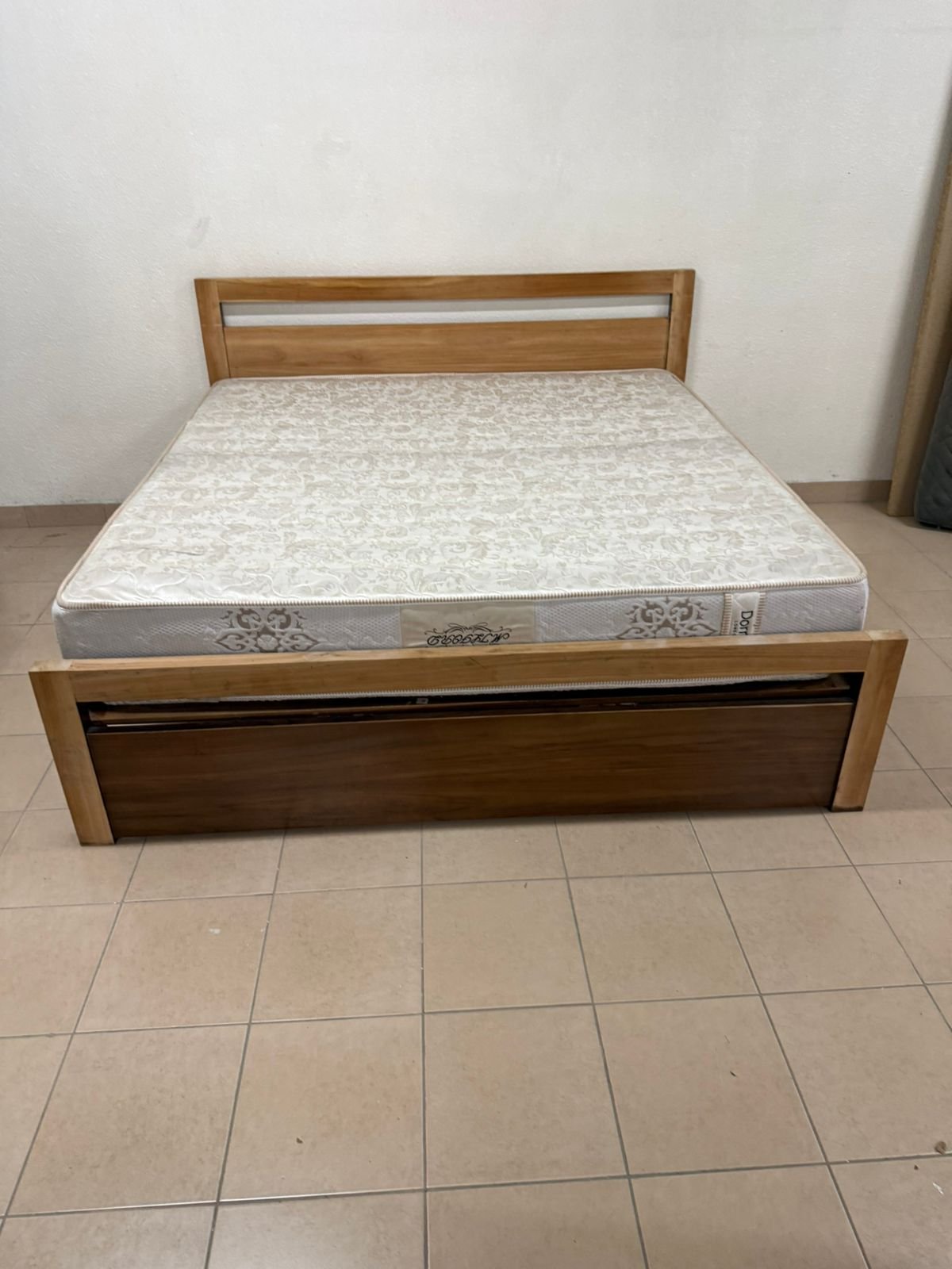 Natural wood bed with a modern design and built-in storage drawers - Image 3