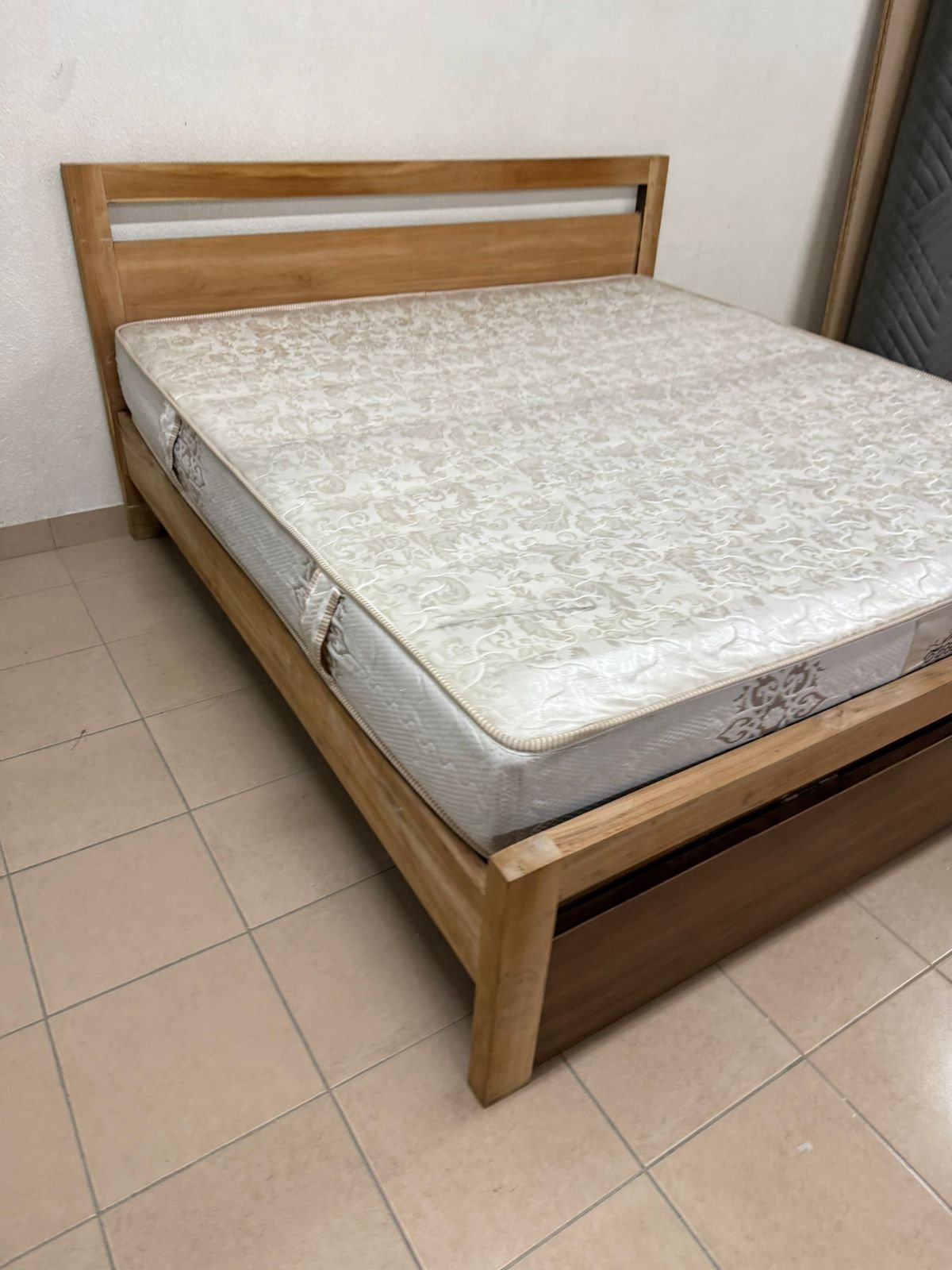 Natural wood bed with a modern design and built-in storage drawers - Image 6