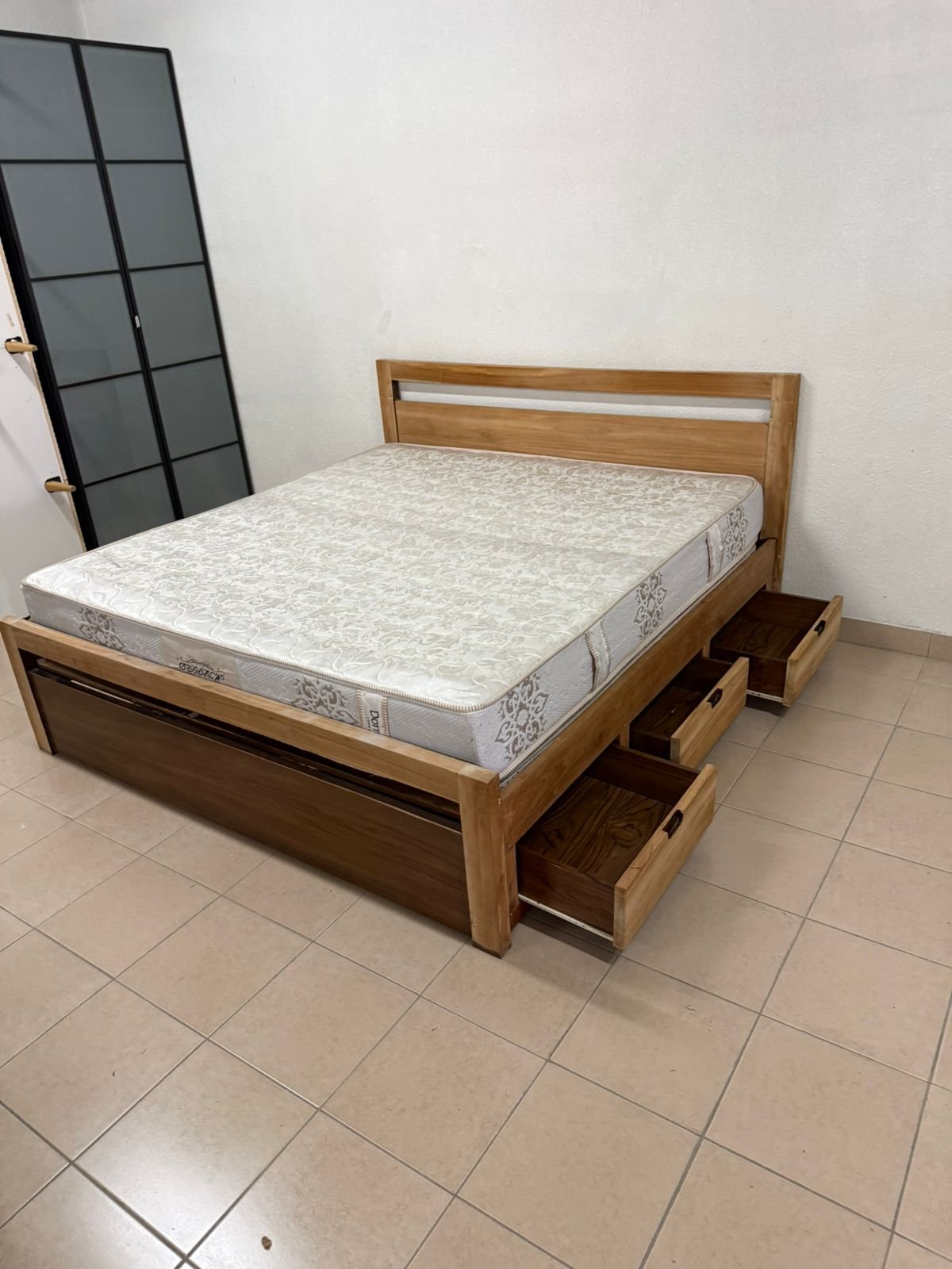 Natural wood bed with a modern design and built-in storage drawers - Image 9