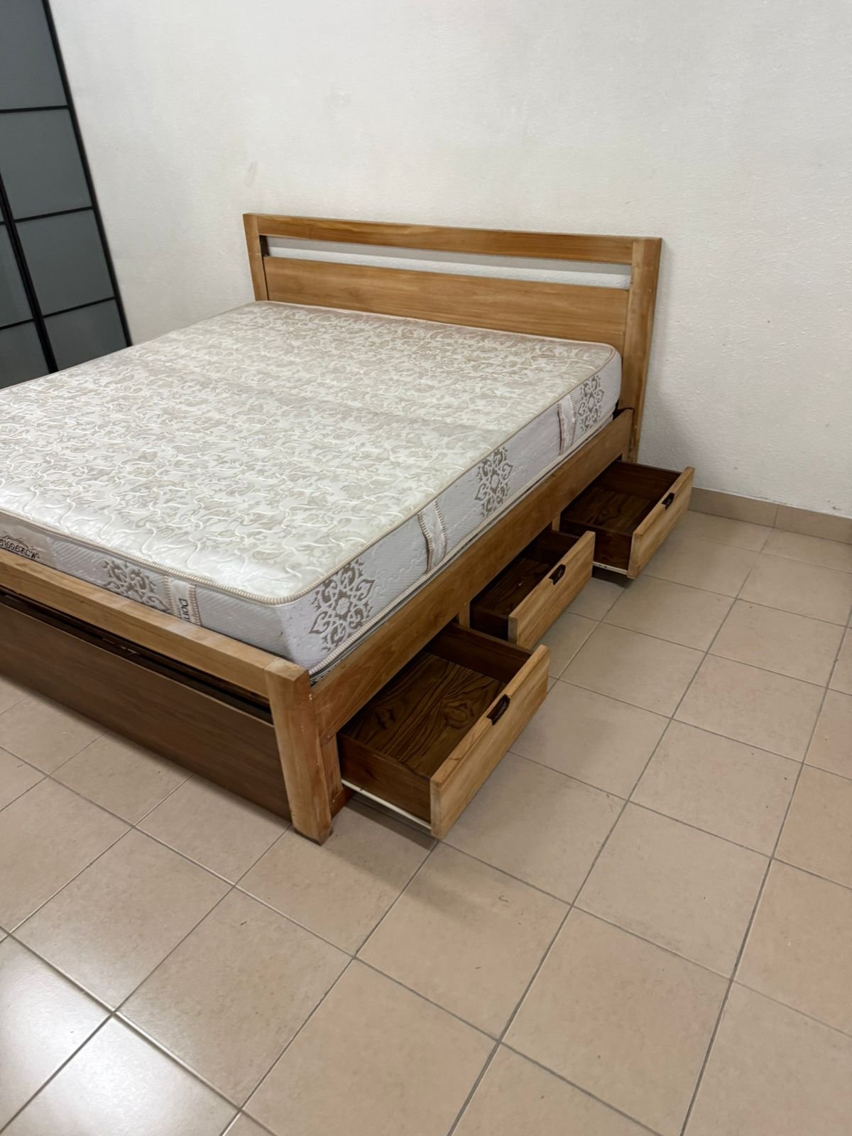 Natural wood bed with a modern design and built-in storage drawers - Image 11