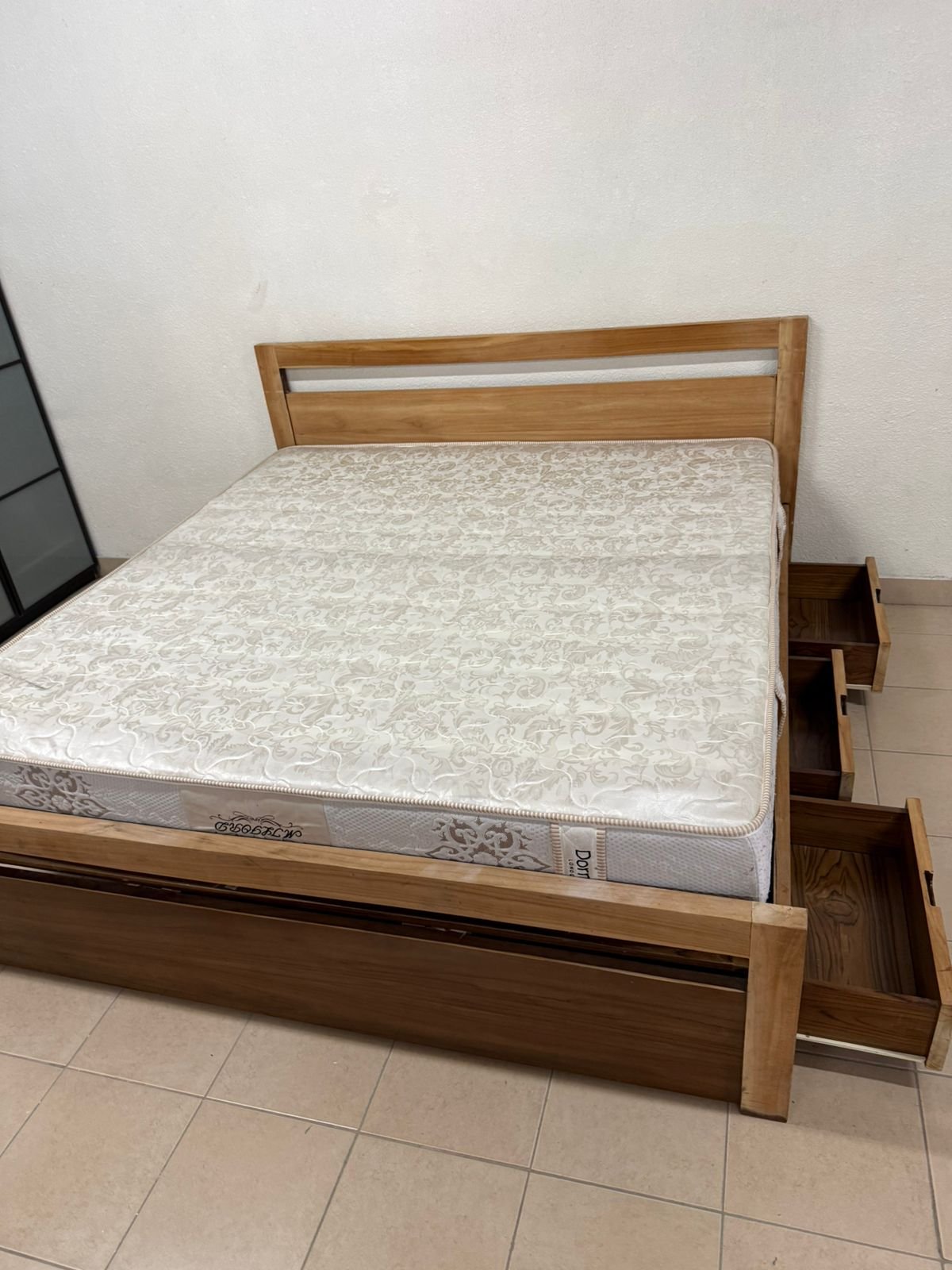 Natural wood bed with a modern design and built-in storage drawers - Image 12