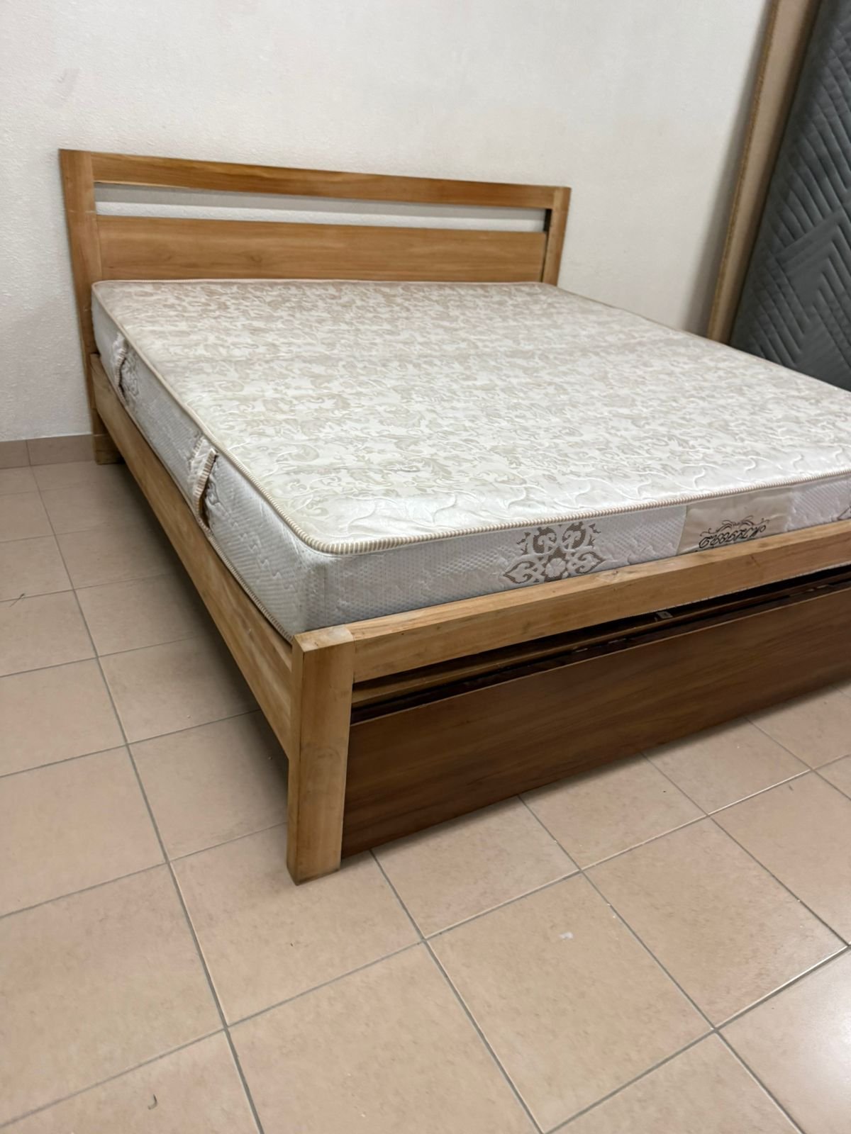 Natural wood bed with a modern design and built-in storage drawers - Image 14