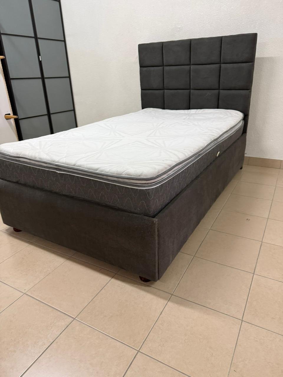 A modern single bed featuring a padded headboard - Image 4