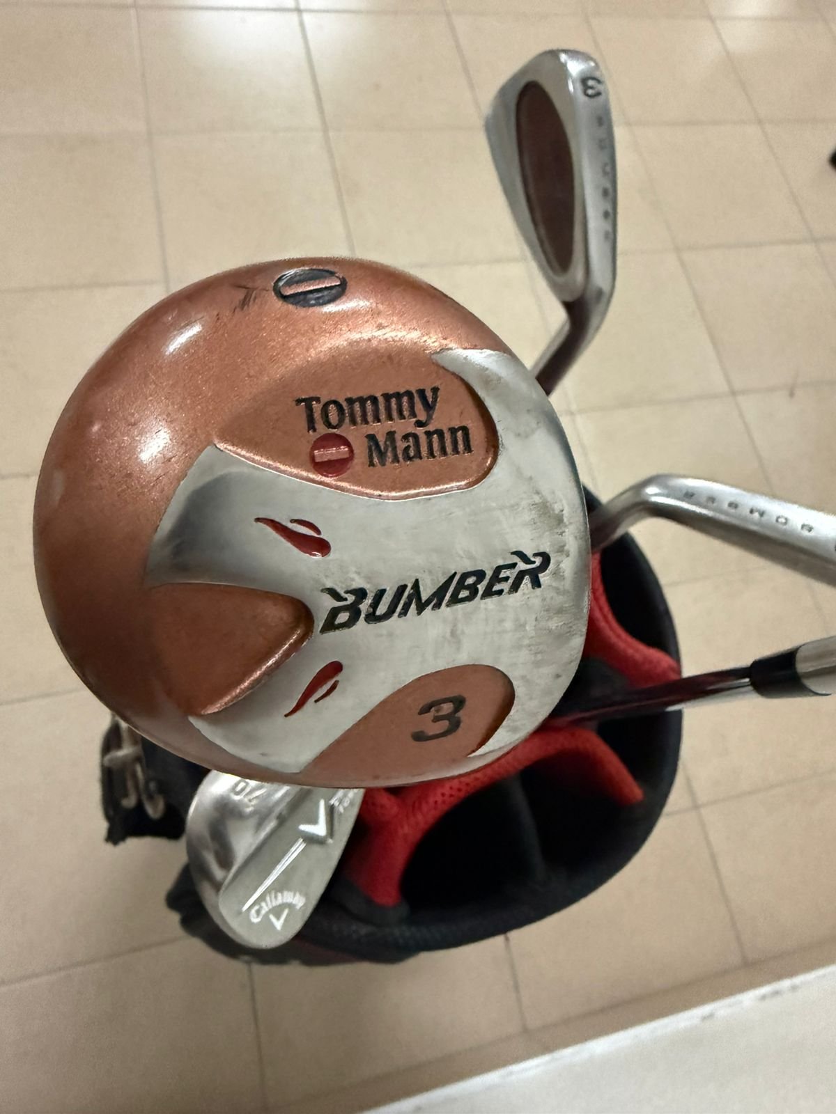 A complete set of golf clubs with a carrying case. - Image 9