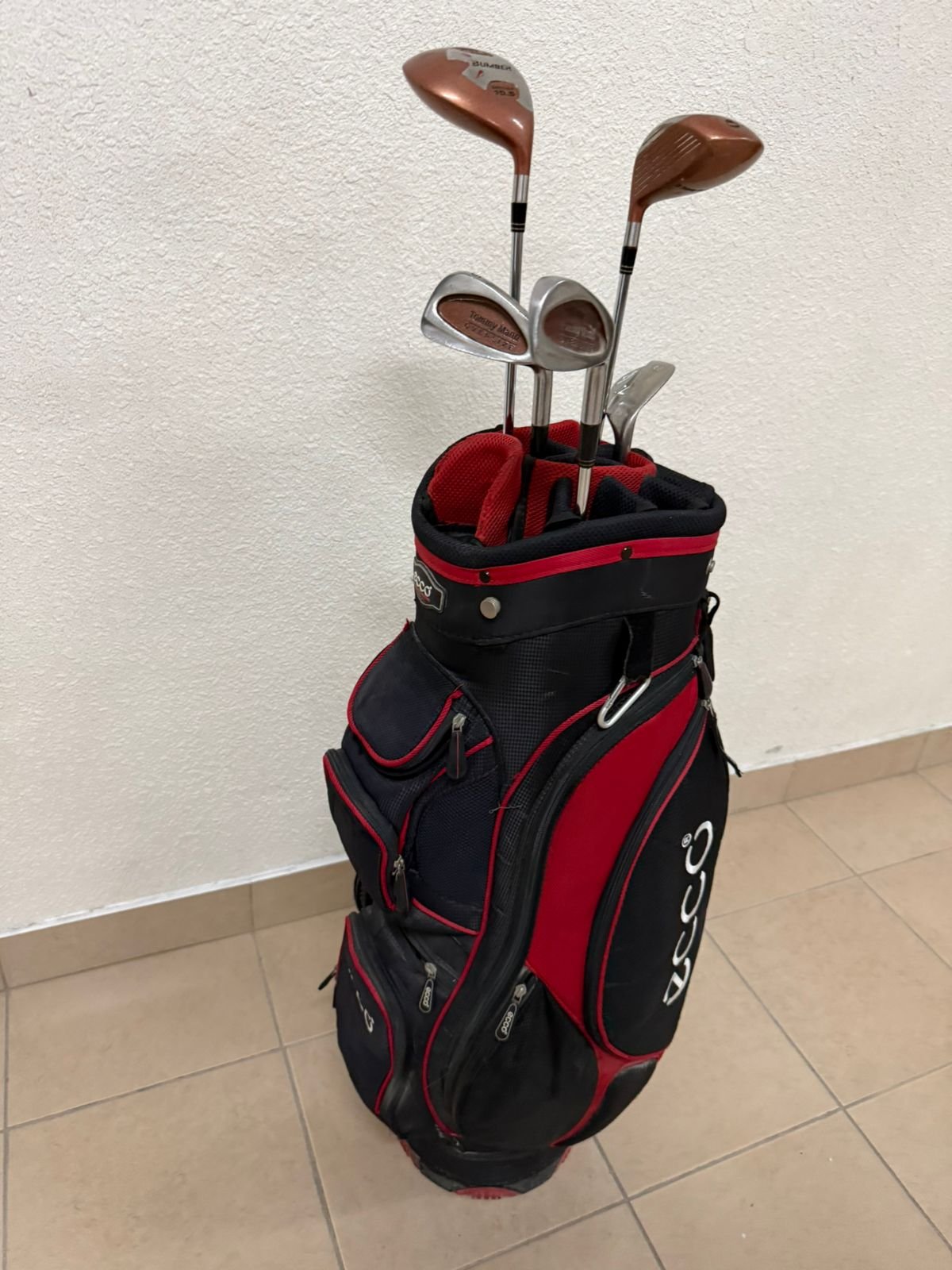 A complete set of golf clubs with a carrying case. - Image 10
