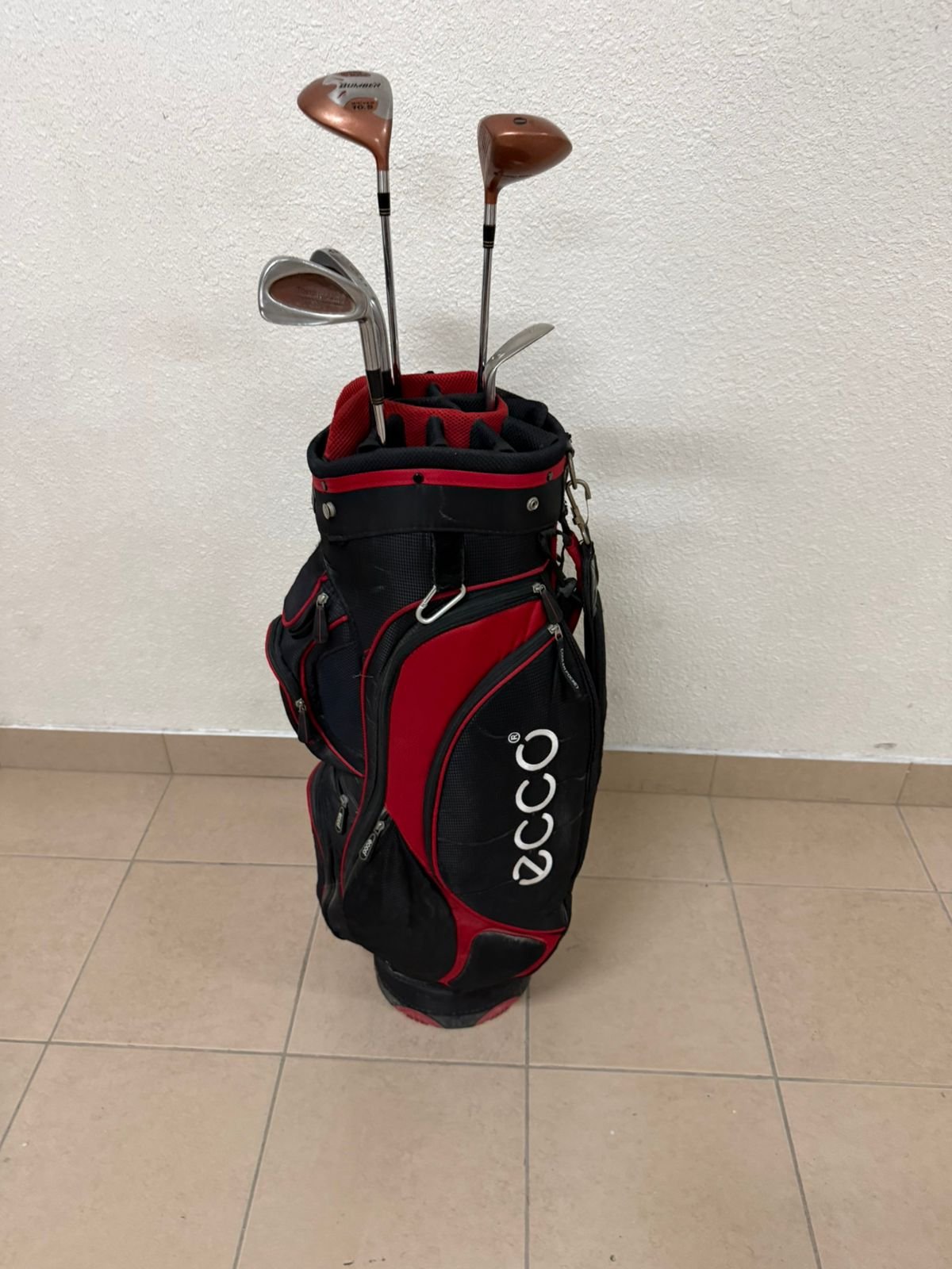A complete set of golf clubs with a carrying case. - Image 11