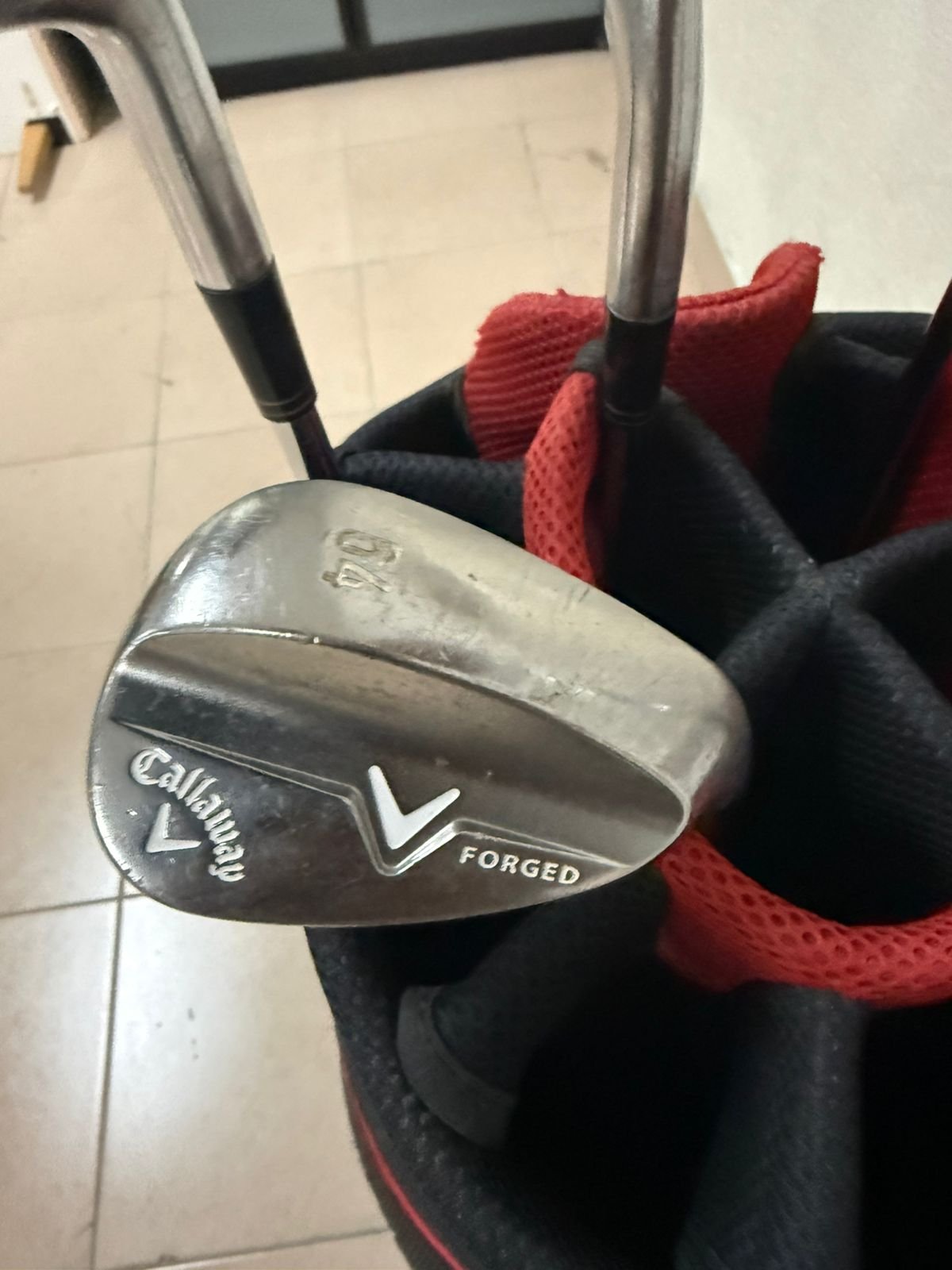 A complete set of golf clubs with a carrying case. - Image 12