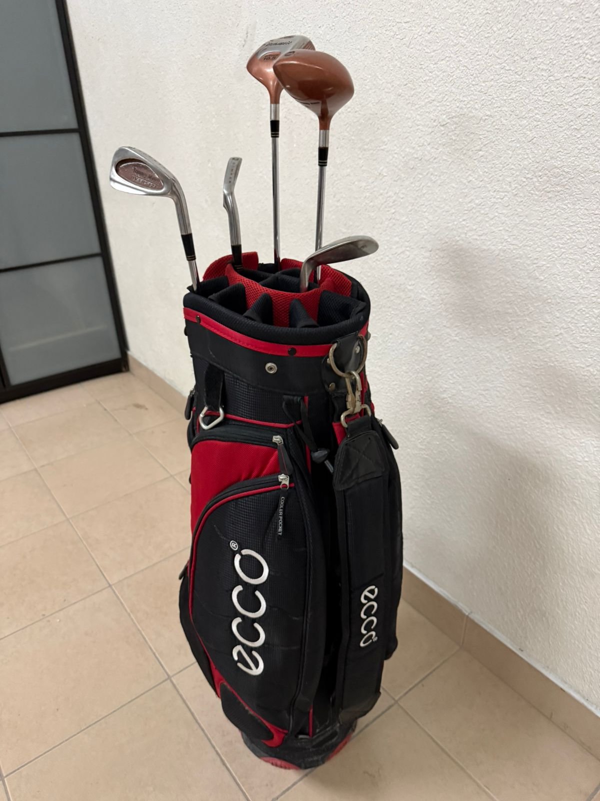 A complete set of golf clubs with a carrying case. - Image 15