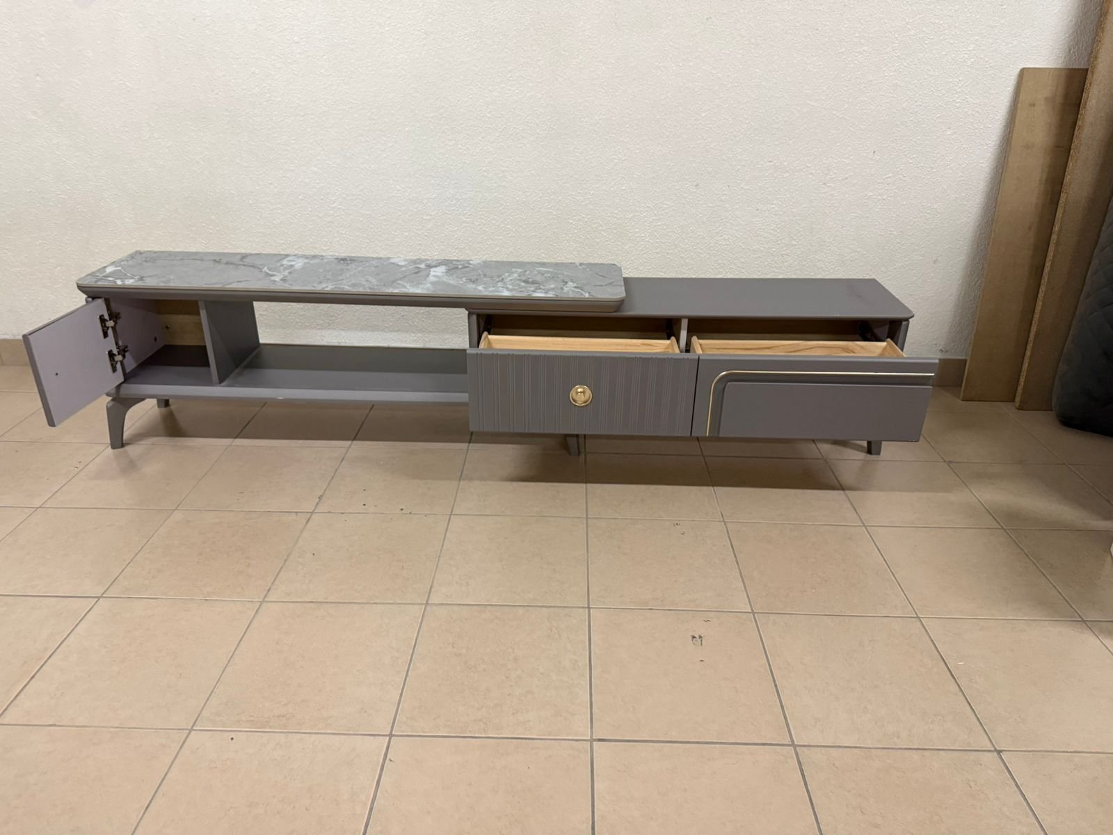 Modern gray extendable TV table with a marble top. - Image 5
