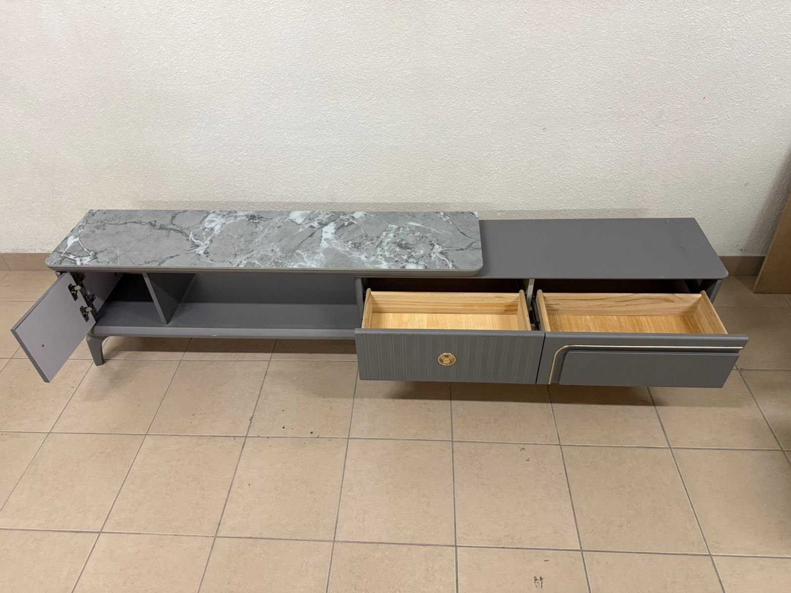 Modern gray extendable TV table with a marble top. - Image 11