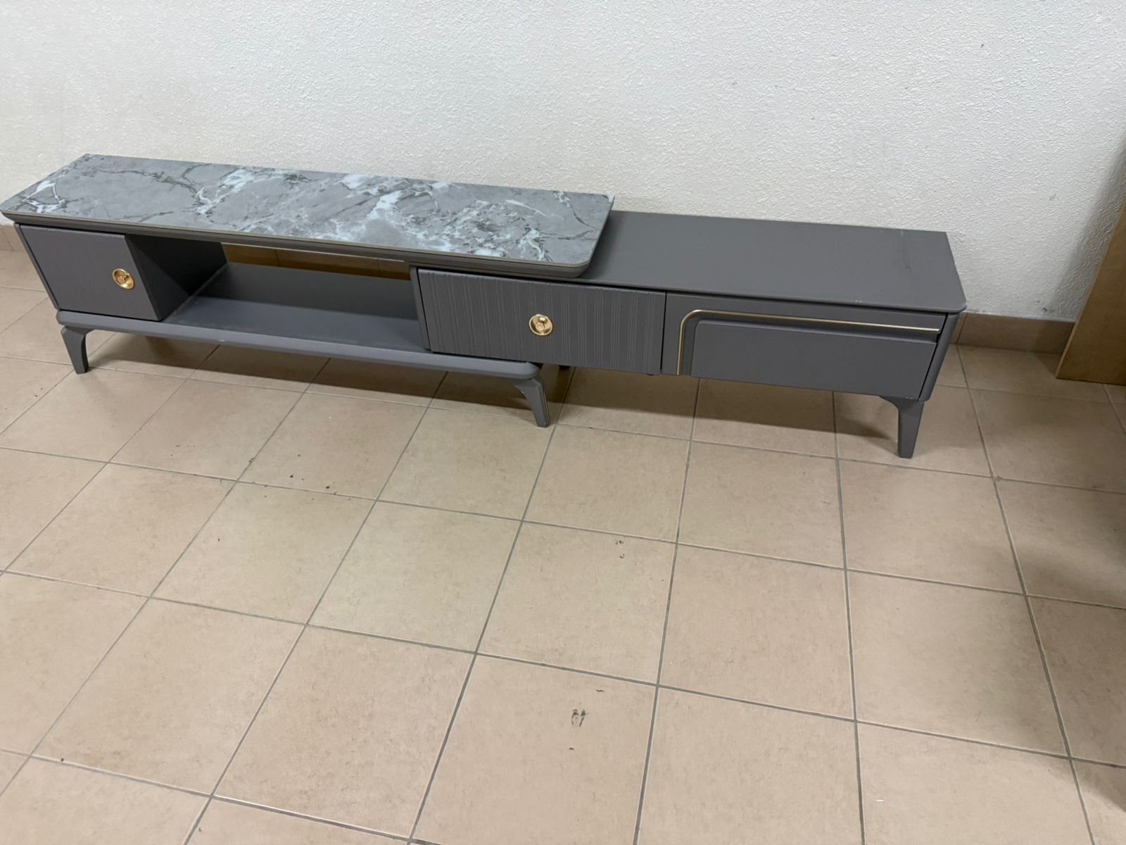 Modern gray extendable TV table with a marble top. - Image 12