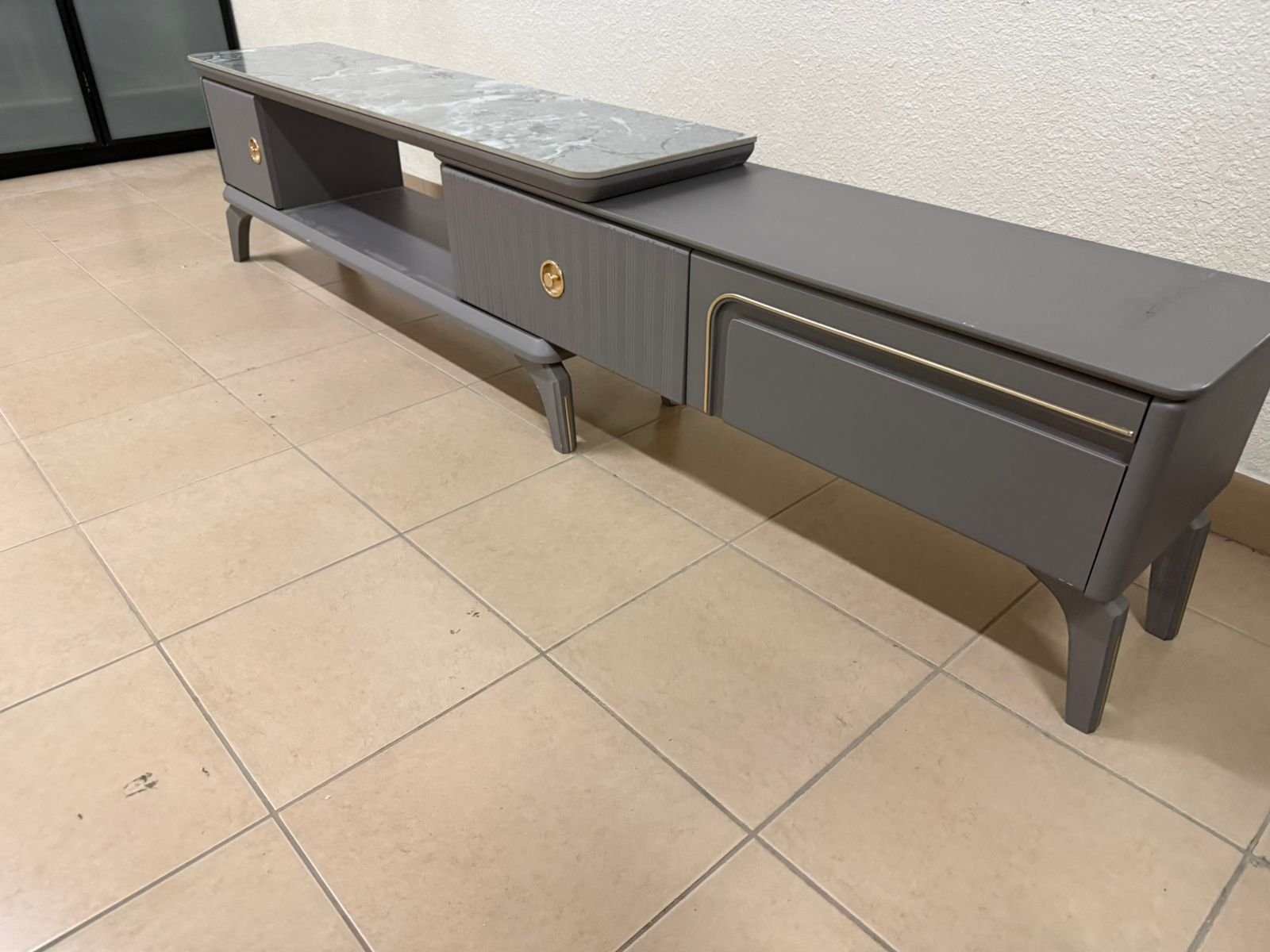 Modern gray extendable TV table with a marble top. - Image 15