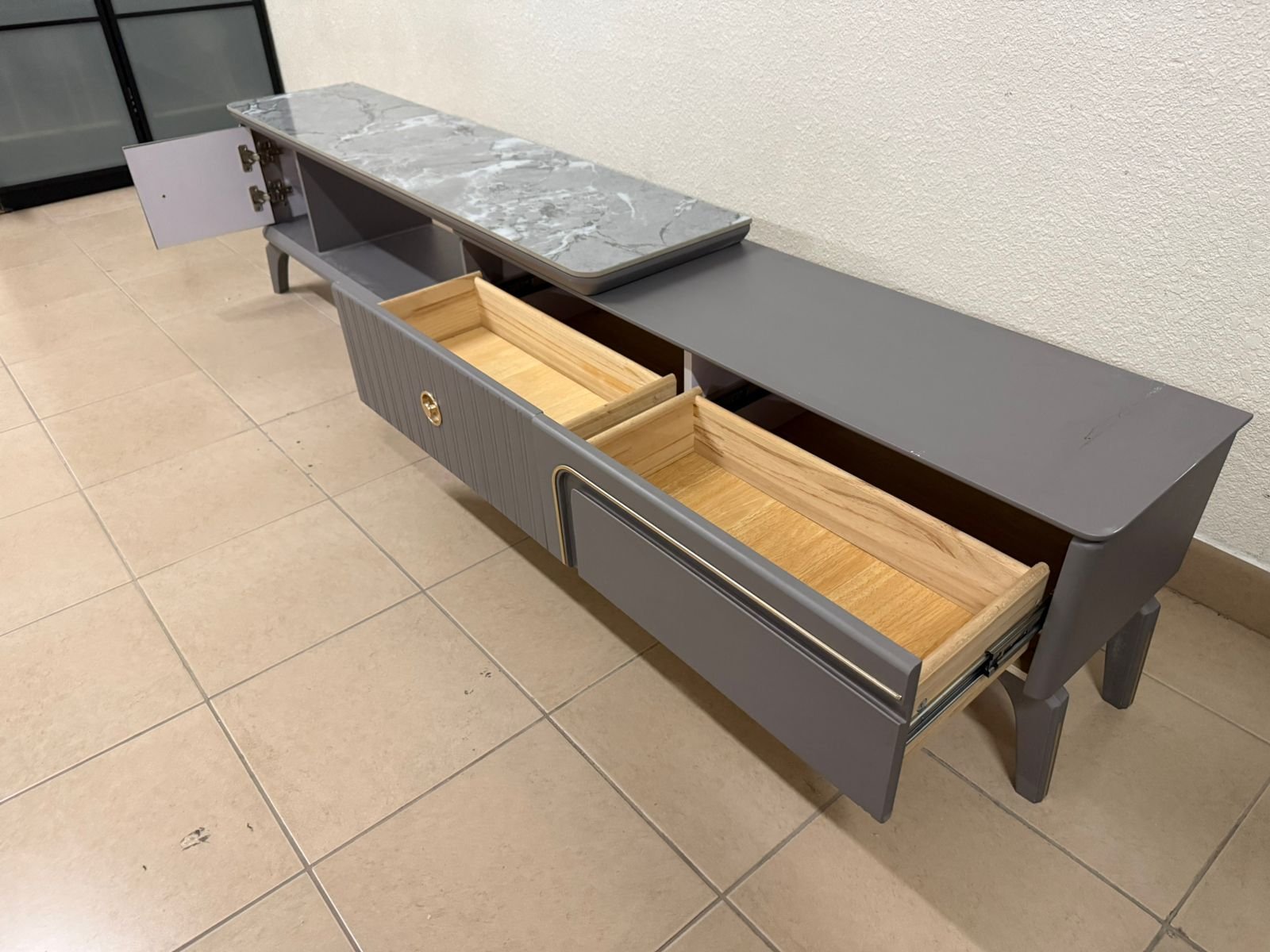 Modern gray extendable TV table with a marble top. - Image 16