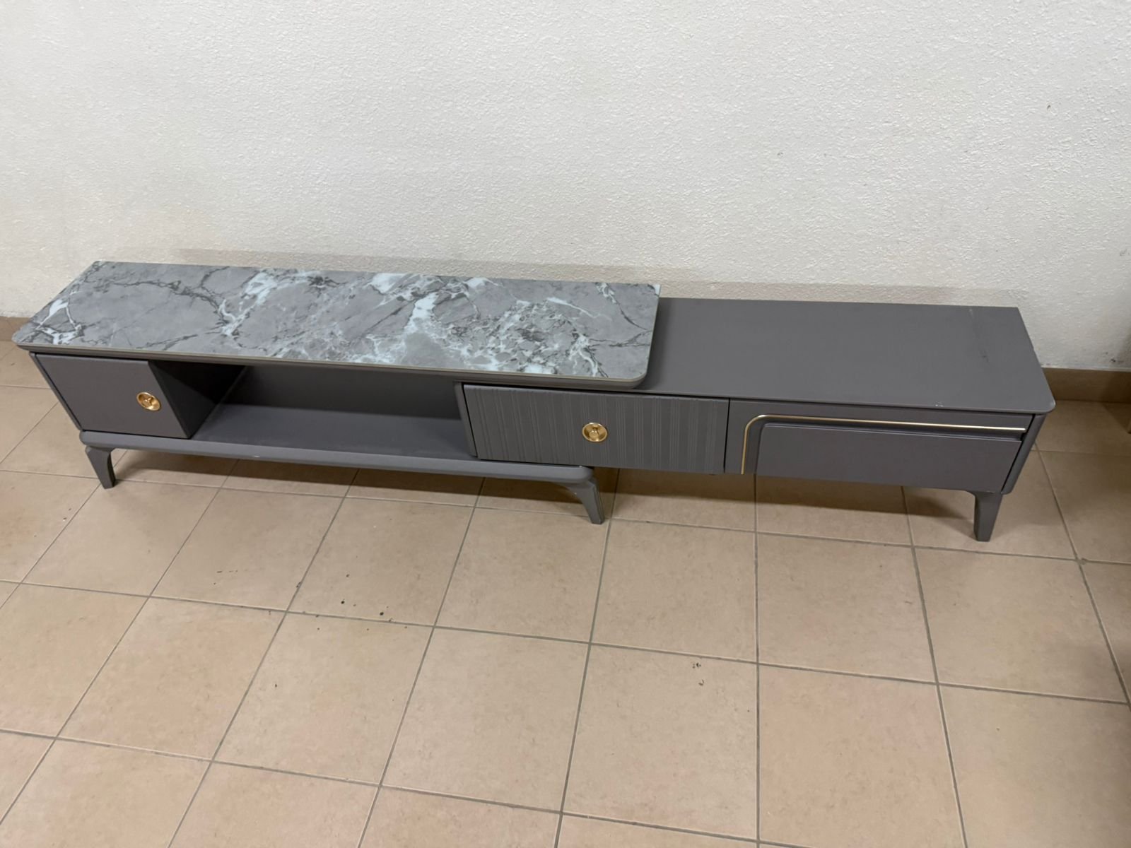 Modern gray extendable TV table with a marble top. - Image 17