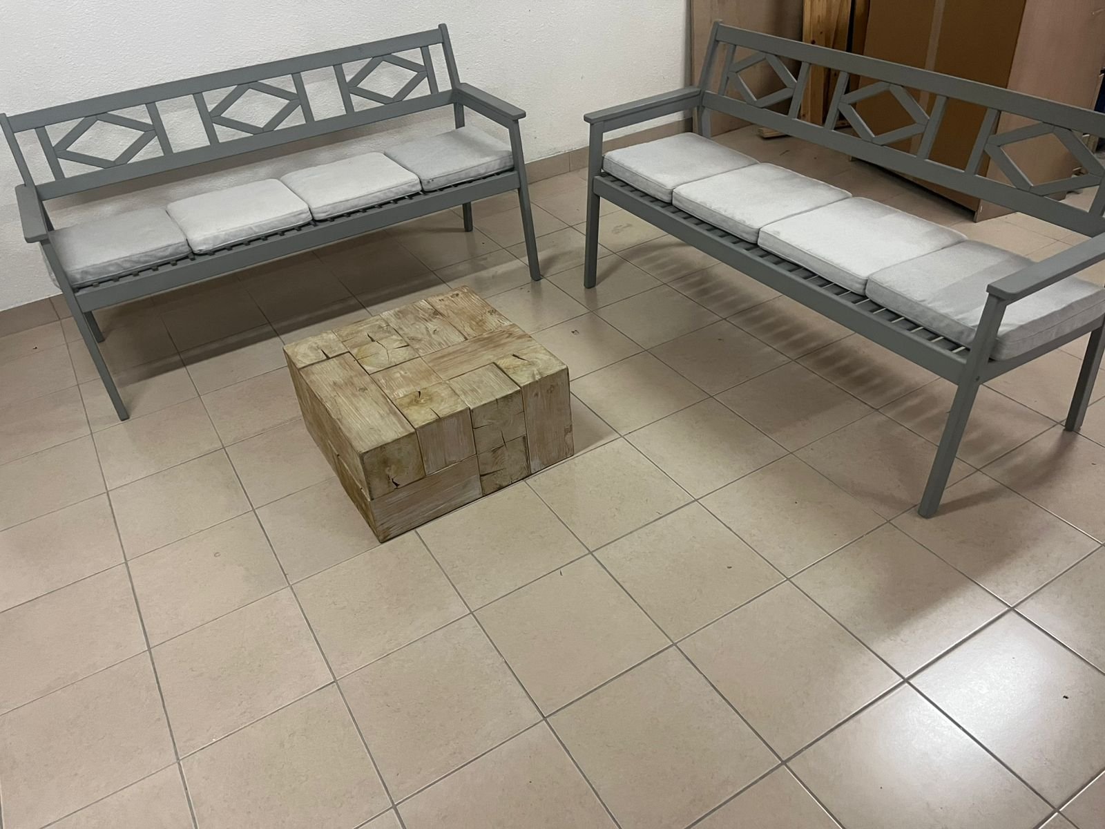 Garden benches from IKEA made of durable acacia wood in gray.