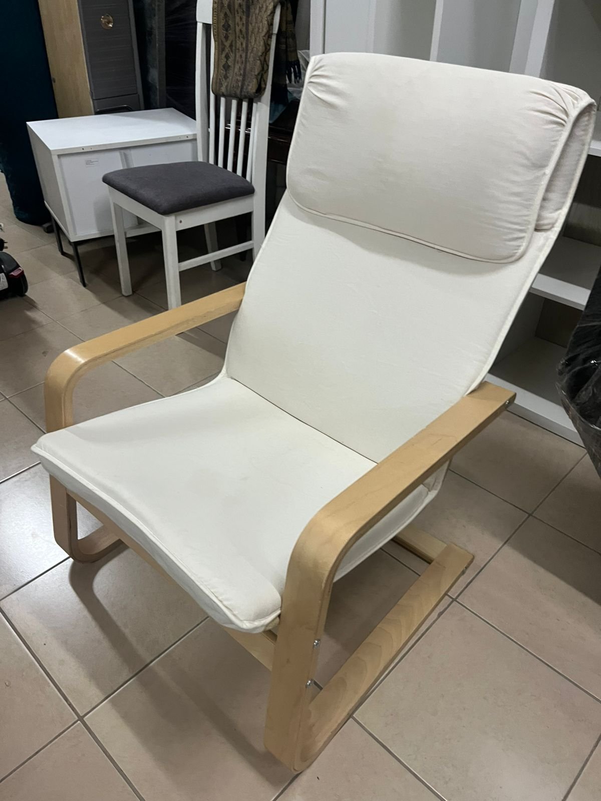 Chair - from IKEA with a natural wood frame and beige cushion - Image 2