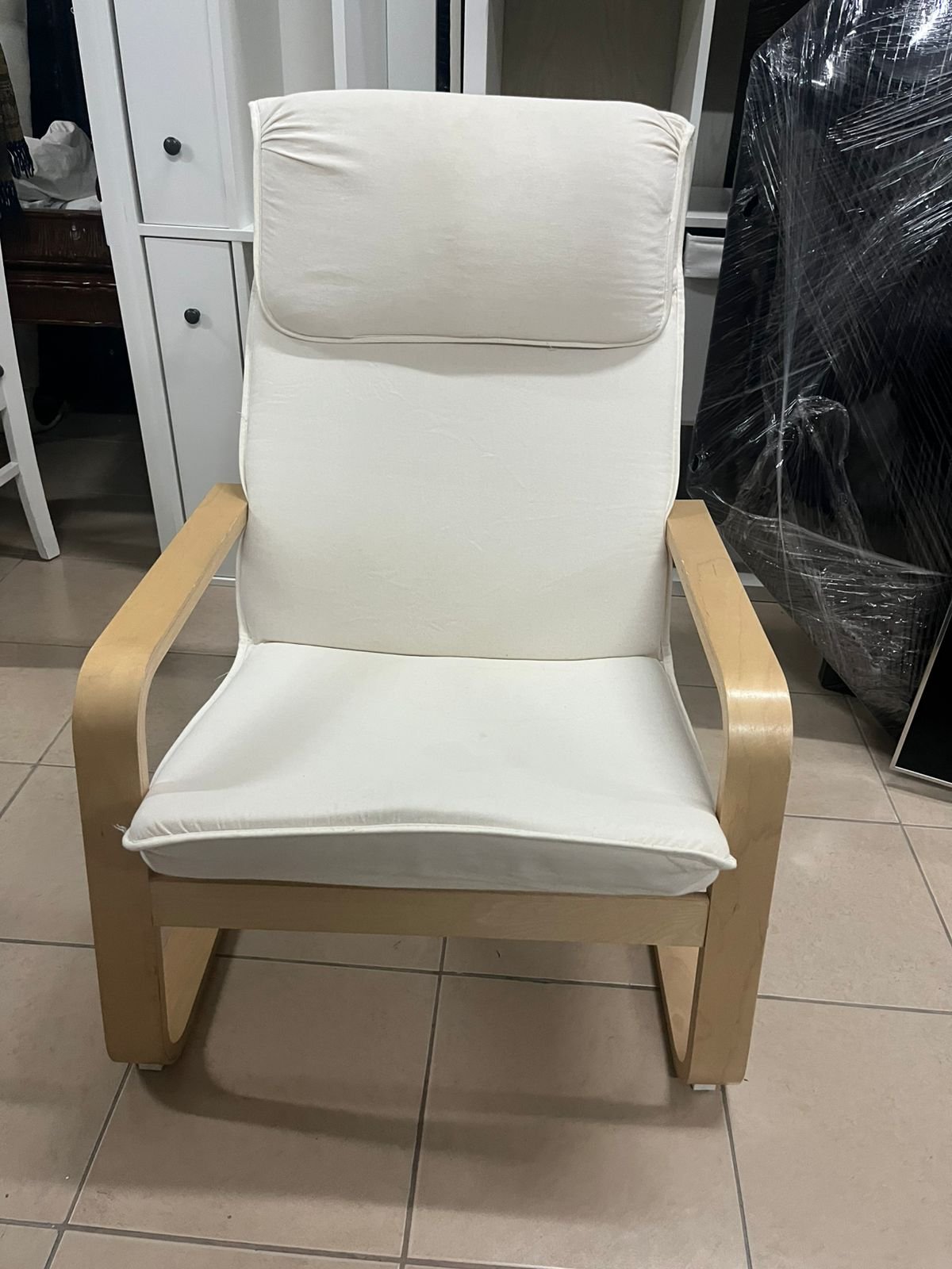 Chair - from IKEA with a natural wood frame and beige cushion - Image 3