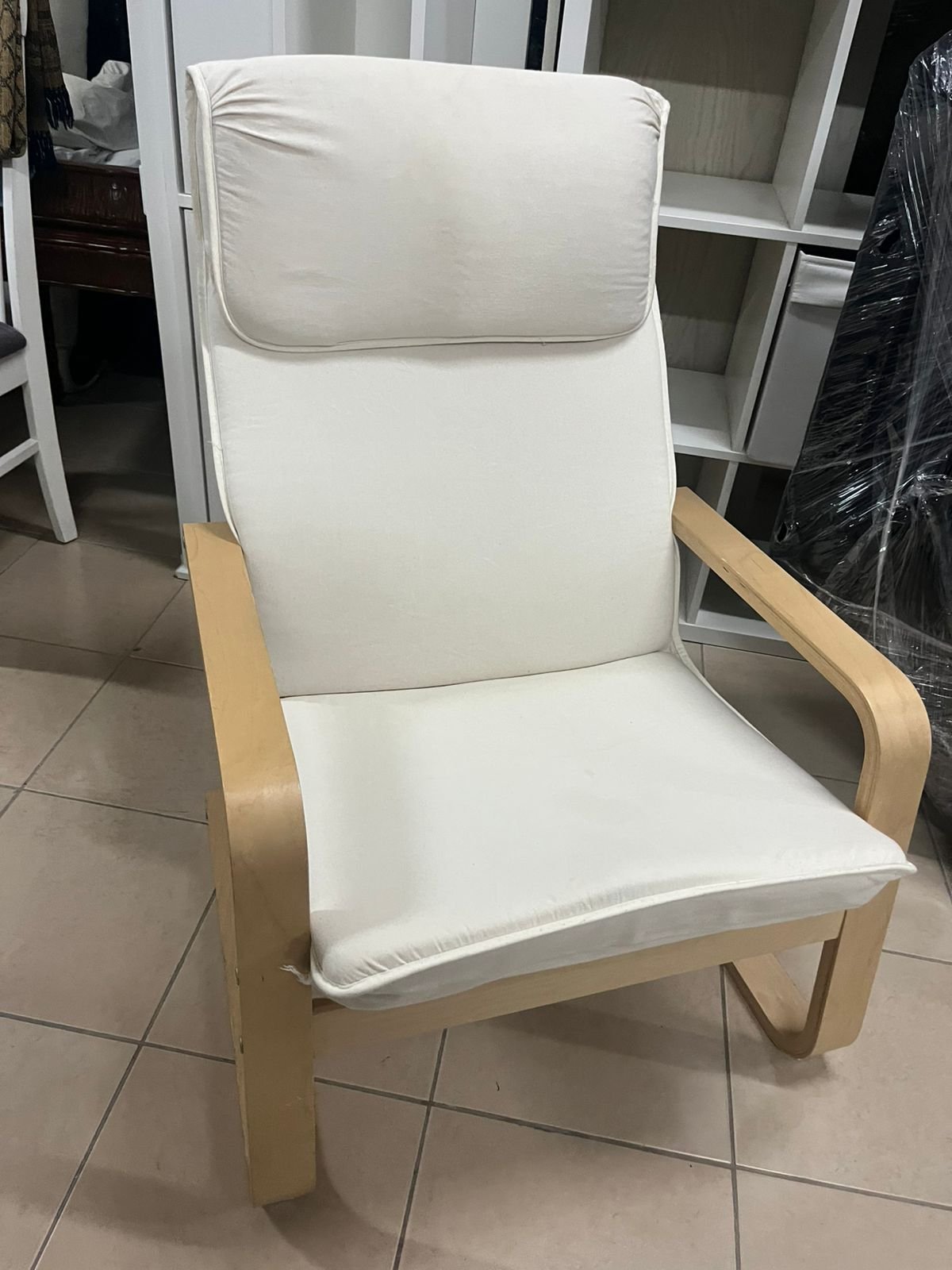 Chair - from IKEA with a natural wood frame and beige cushion - Image 5